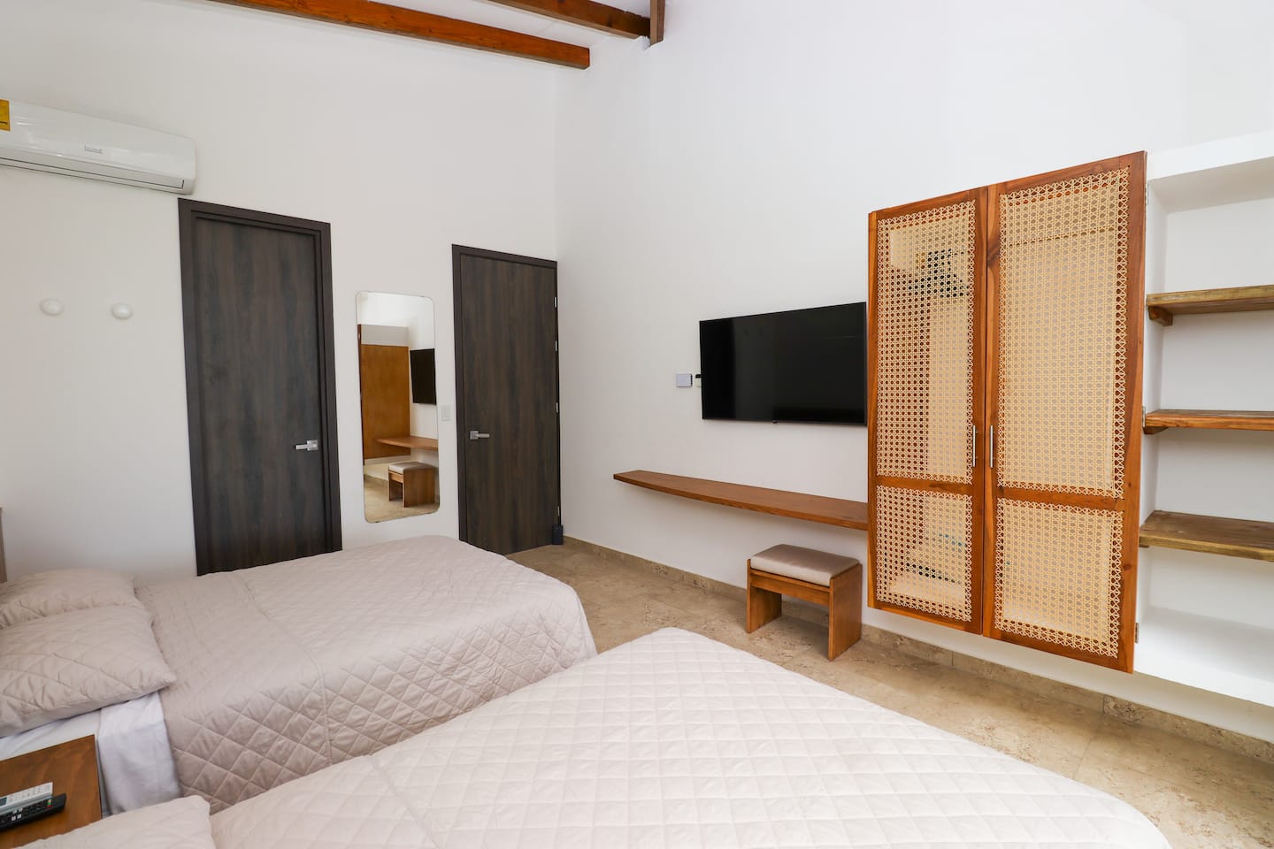 Alternate view of Bedroom 3 with two double beds